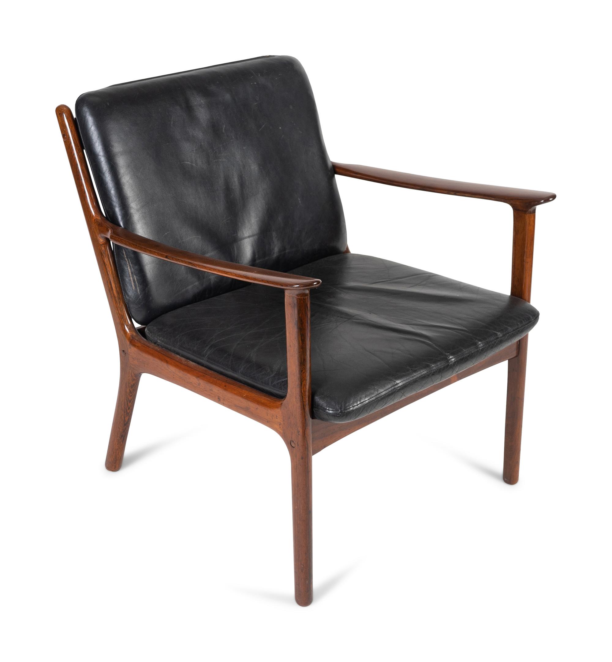 An Ole Wanscher Palasander Armchair — DANISH, 1903-1985