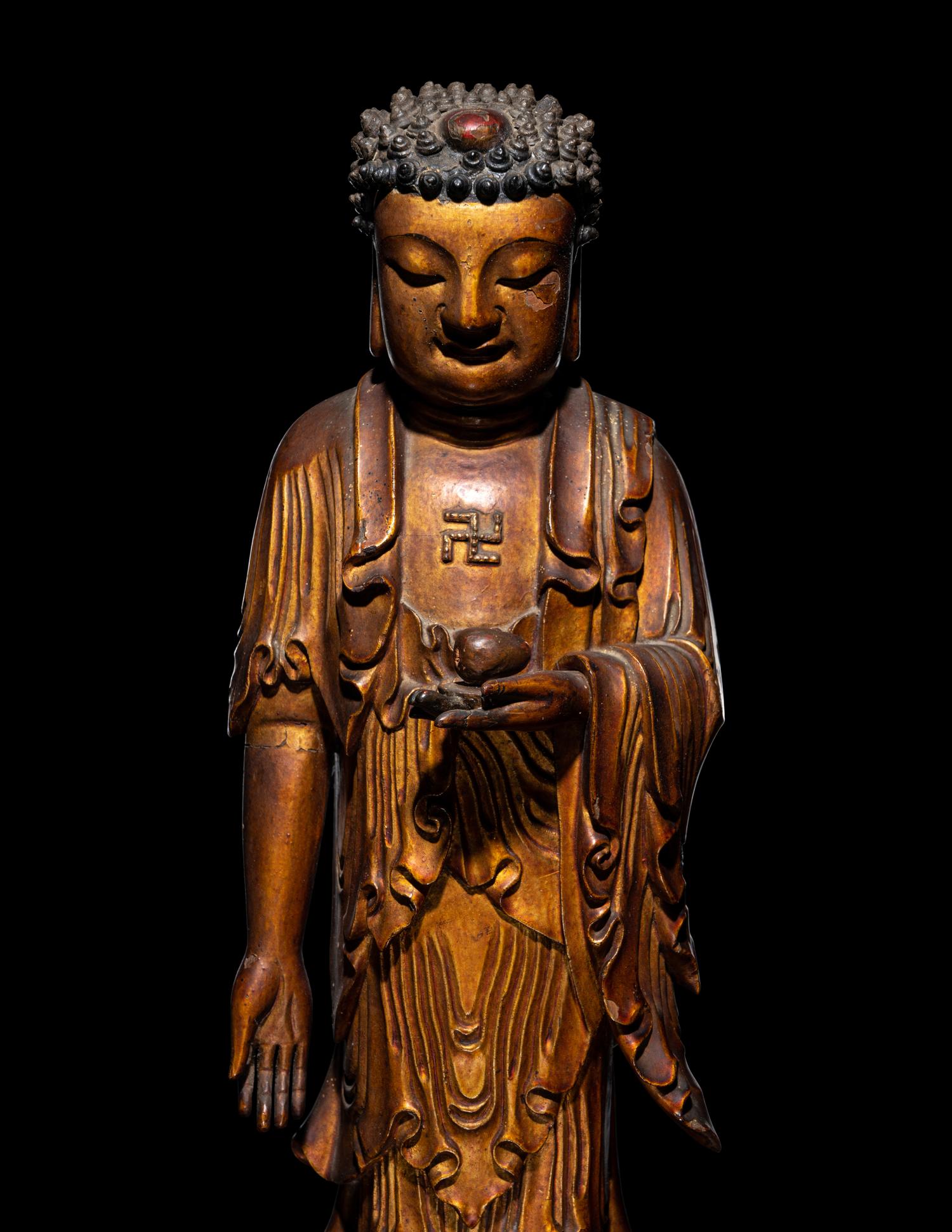 A Gilt Lacquered Wood Figure of Buddha Shakyamuni
