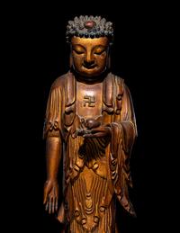 A Gilt Lacquered Wood Figure of Buddha Shakyamuni