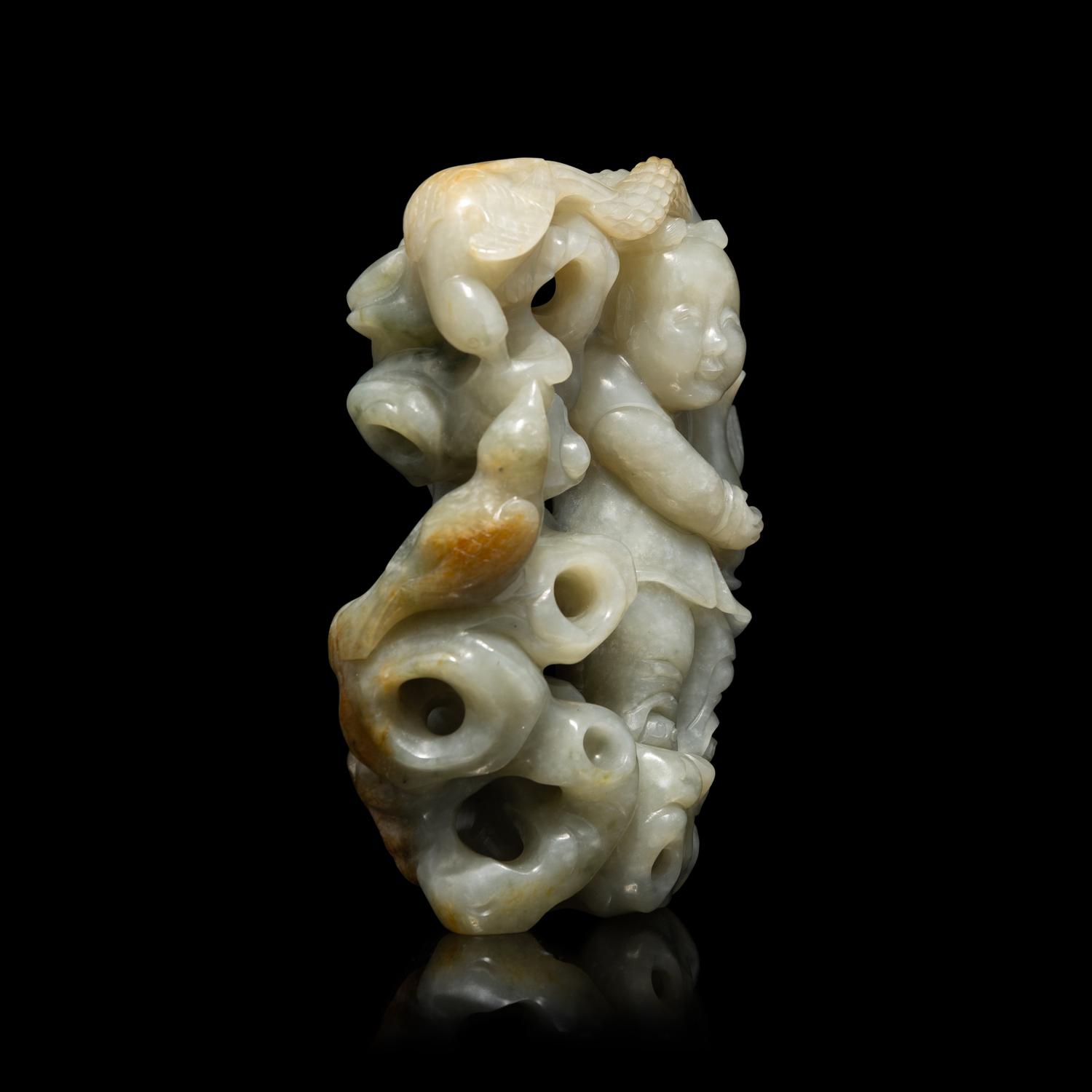 A Chinese Greyish Celadon Jade Group of a Boy and Birds, Qing Dynasty 清 青玉鏤雕童子持蓮