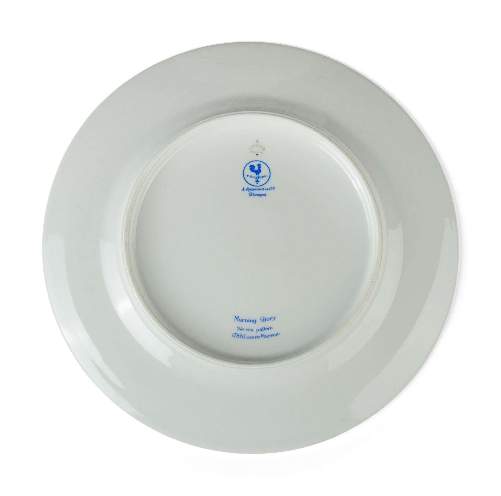 A Raynaud Limoges Porcelain Dinner Service