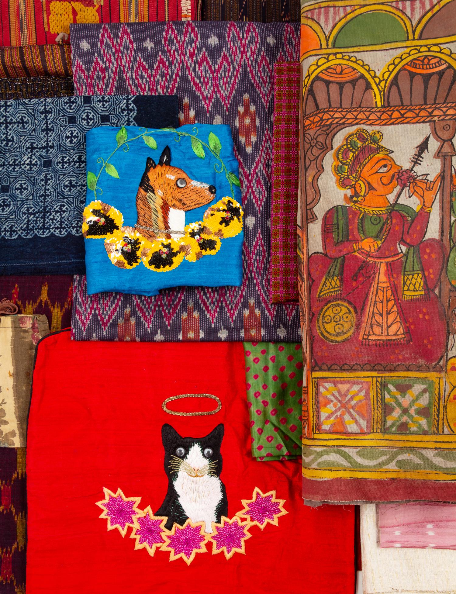 Twenty Asian Textiles Approximate length of largest 70 inches.