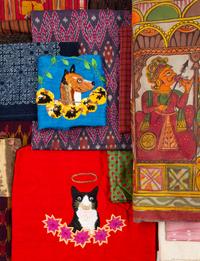 Twenty Asian Textiles Approximate length of largest 70 inches.