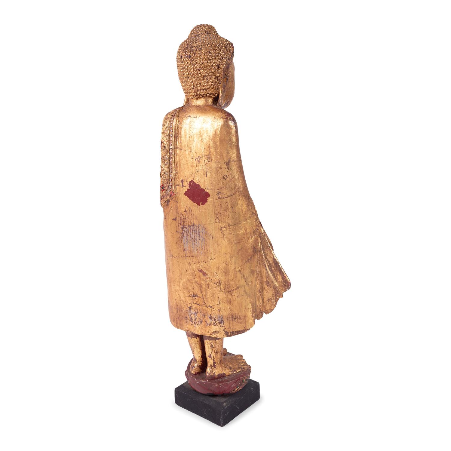 A Chinese Carved Gilt Wood Standing Buddha Figure