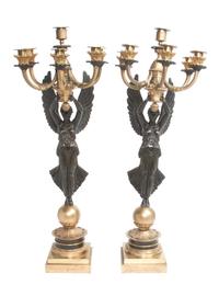A Pair of Gilt and Patinated Bronze Six-Light Figural Candelabra
