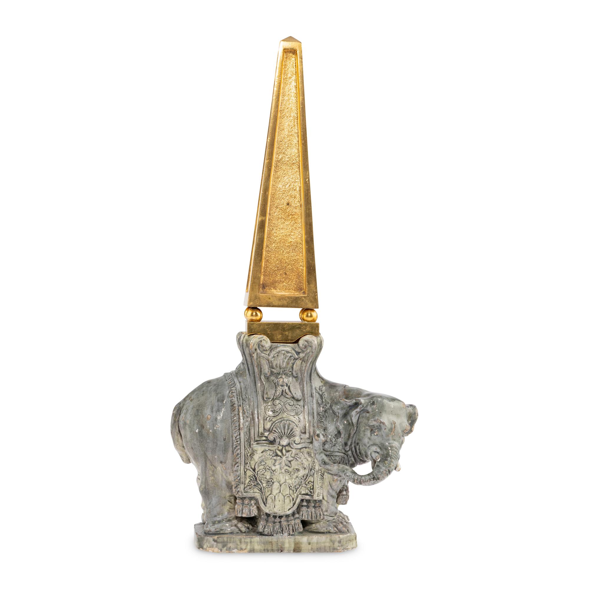 A Continental Gilt Bronze and Glazed Earthenware Elephant Obelisk