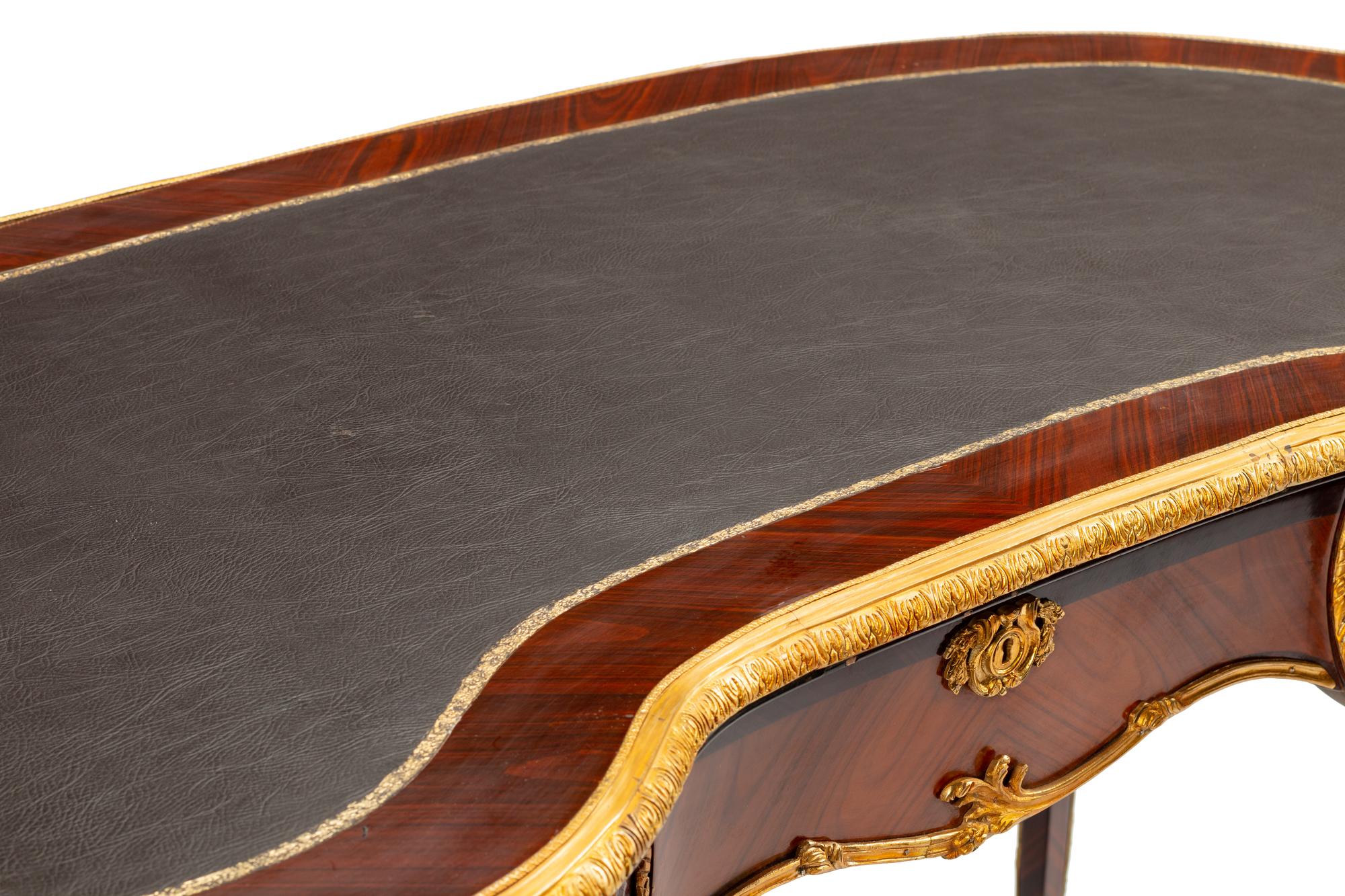 A Louis XV Style Gilt Bronze Mounted Reniform Bureau Plat