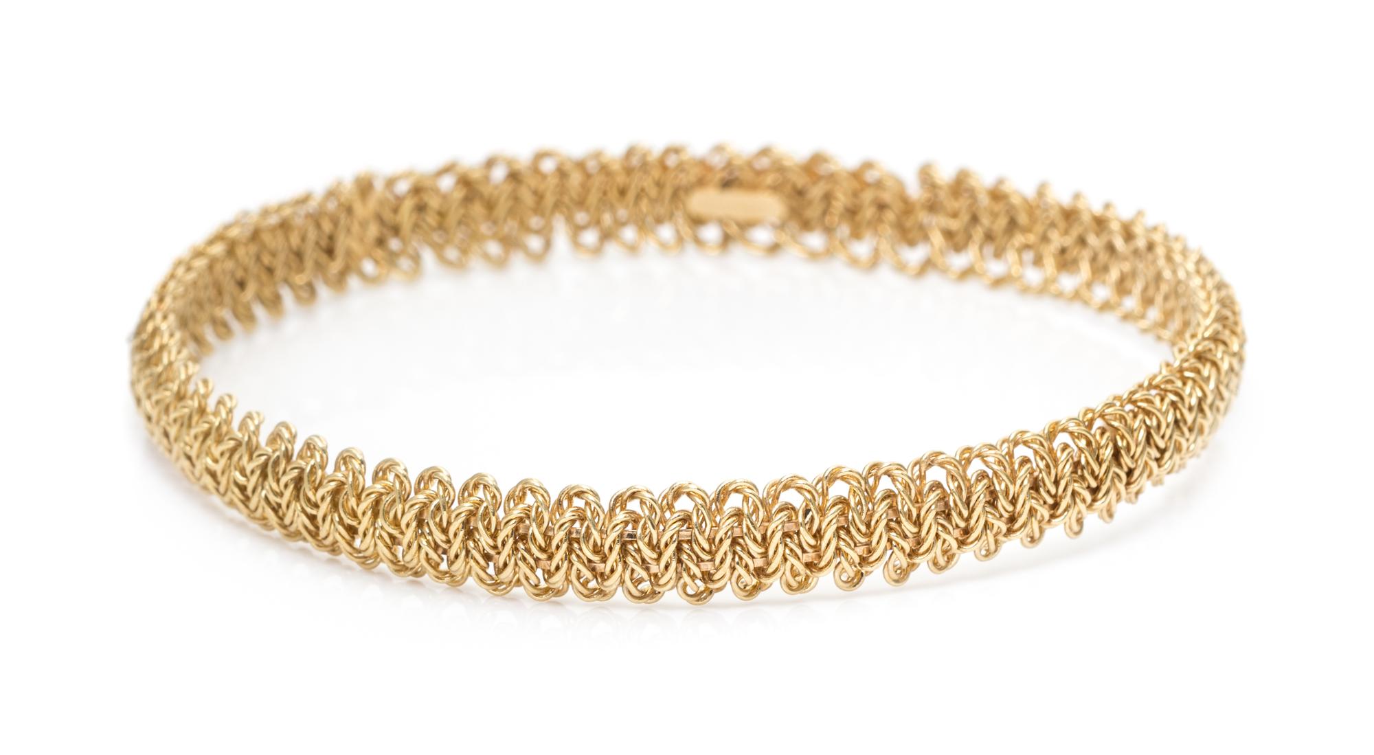 An 18 Karat Yellow Gold Bangle Bracelet, Tiffany & Co., France, 15.00 dwts.