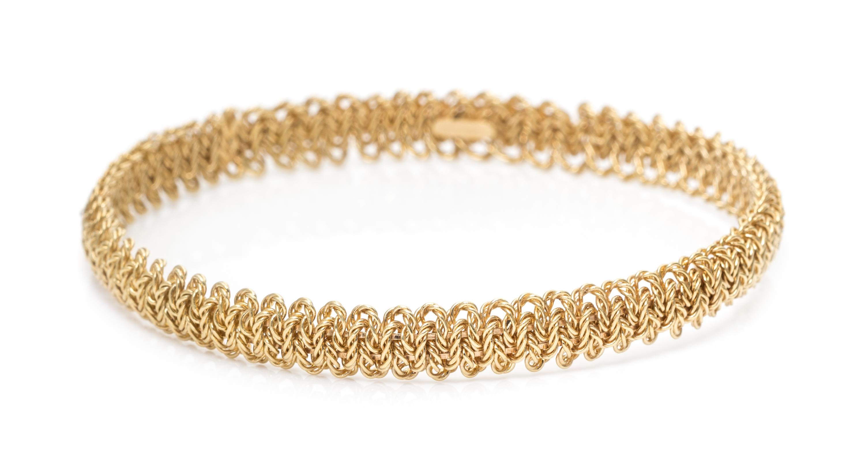 An 18 Karat Yellow Gold Bangle Bracelet, Tiffany & Co., France, 15.00 dwts.