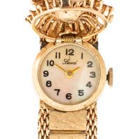 LUVA, 14K YELLOW GOLD AND DIAMOND SURPRISE WATCH