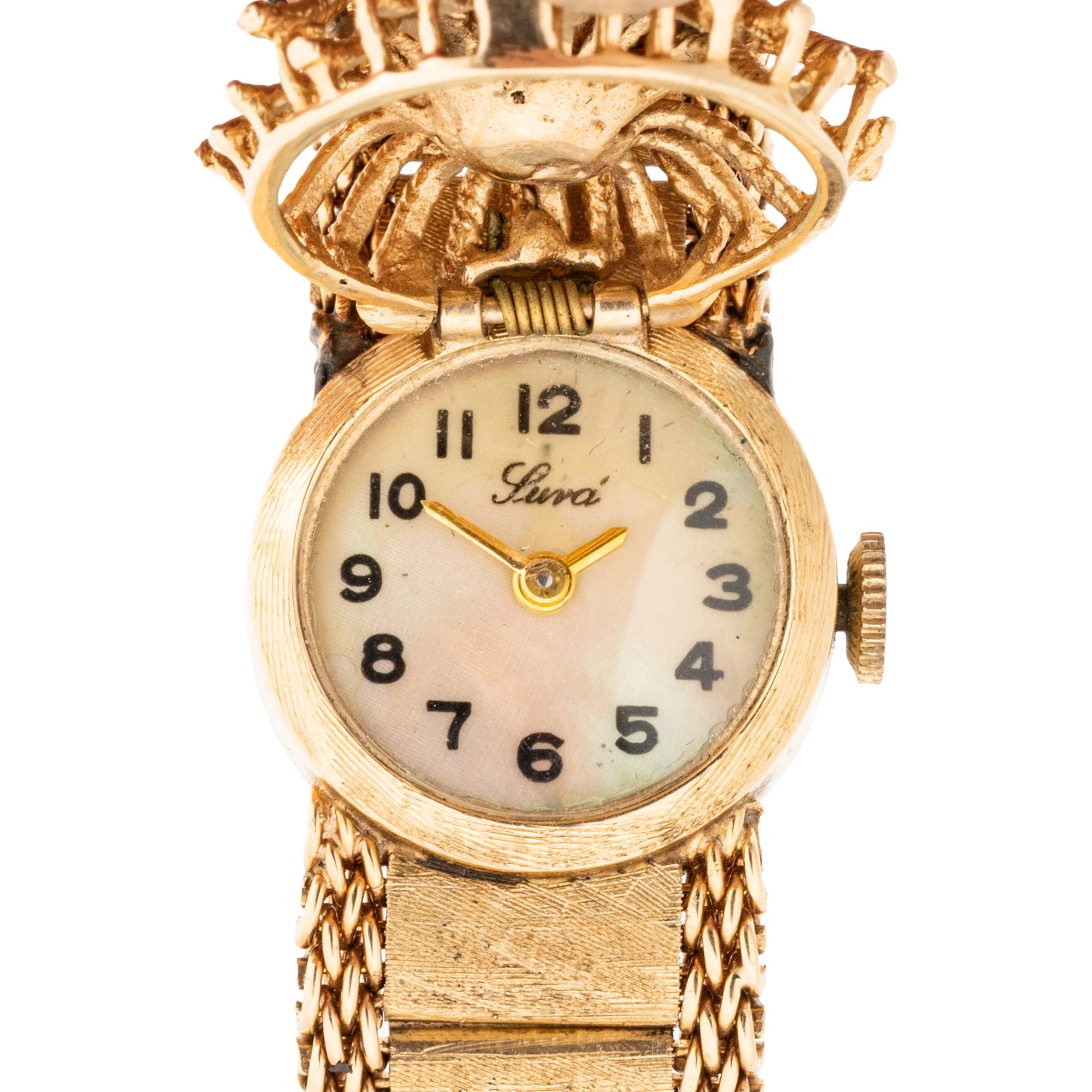 LUVA, 14K YELLOW GOLD AND DIAMOND SURPRISE WATCH