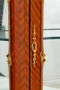 A Pair of Louis XV Style Gilt Metal Mounted Marble-Top Vitrine Cabinets
