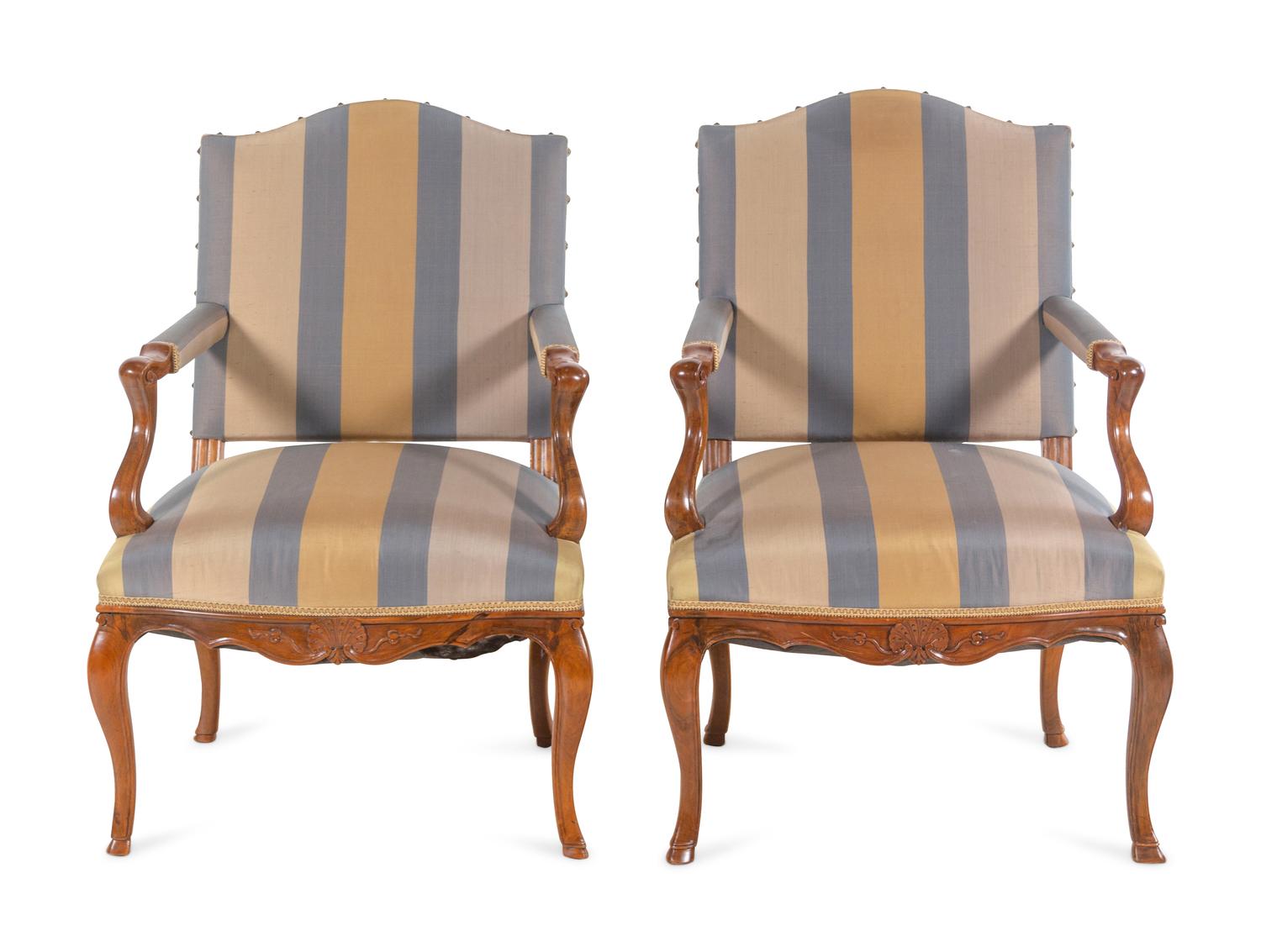 A Pair of Louis XV Walnut Armchairs