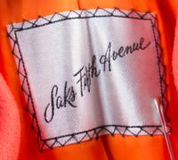 A Saks Fifth Avenue Coral Coat,
