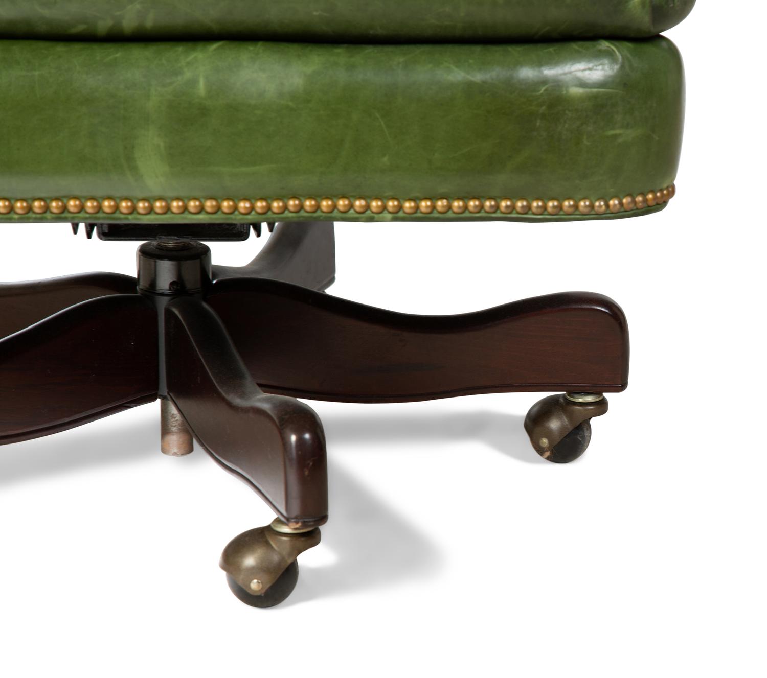 A Green Leather Office Chair — HANCOCK AND MOORE, 20TH CENTURY
