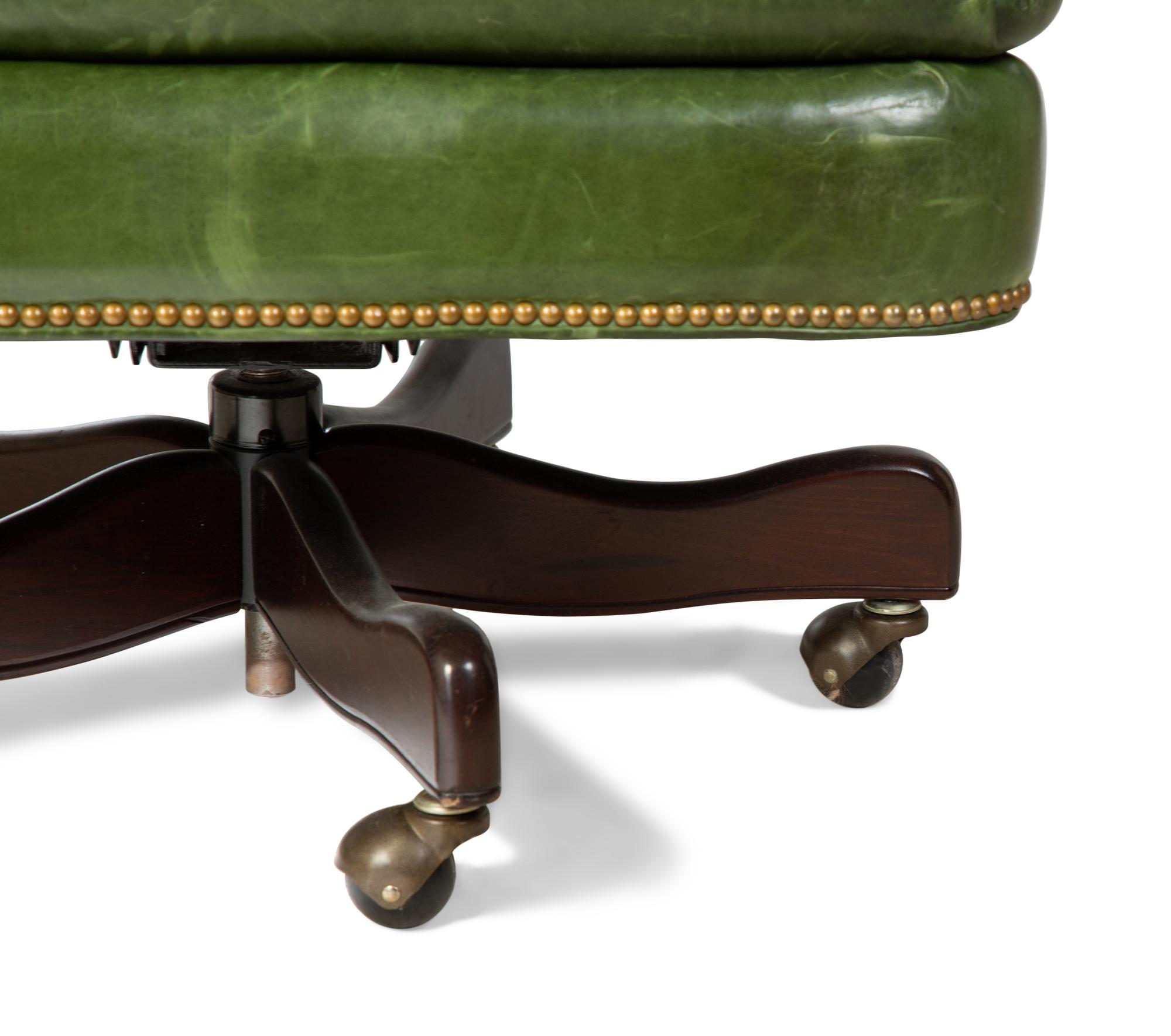 A Green Leather Office Chair — HANCOCK AND MOORE, 20TH CENTURY