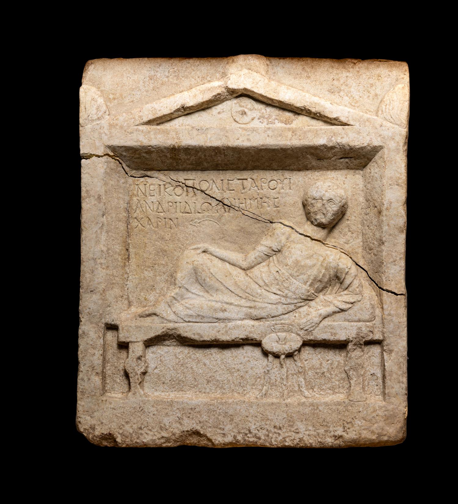 A Roman Marble Stele with Greek Inscription