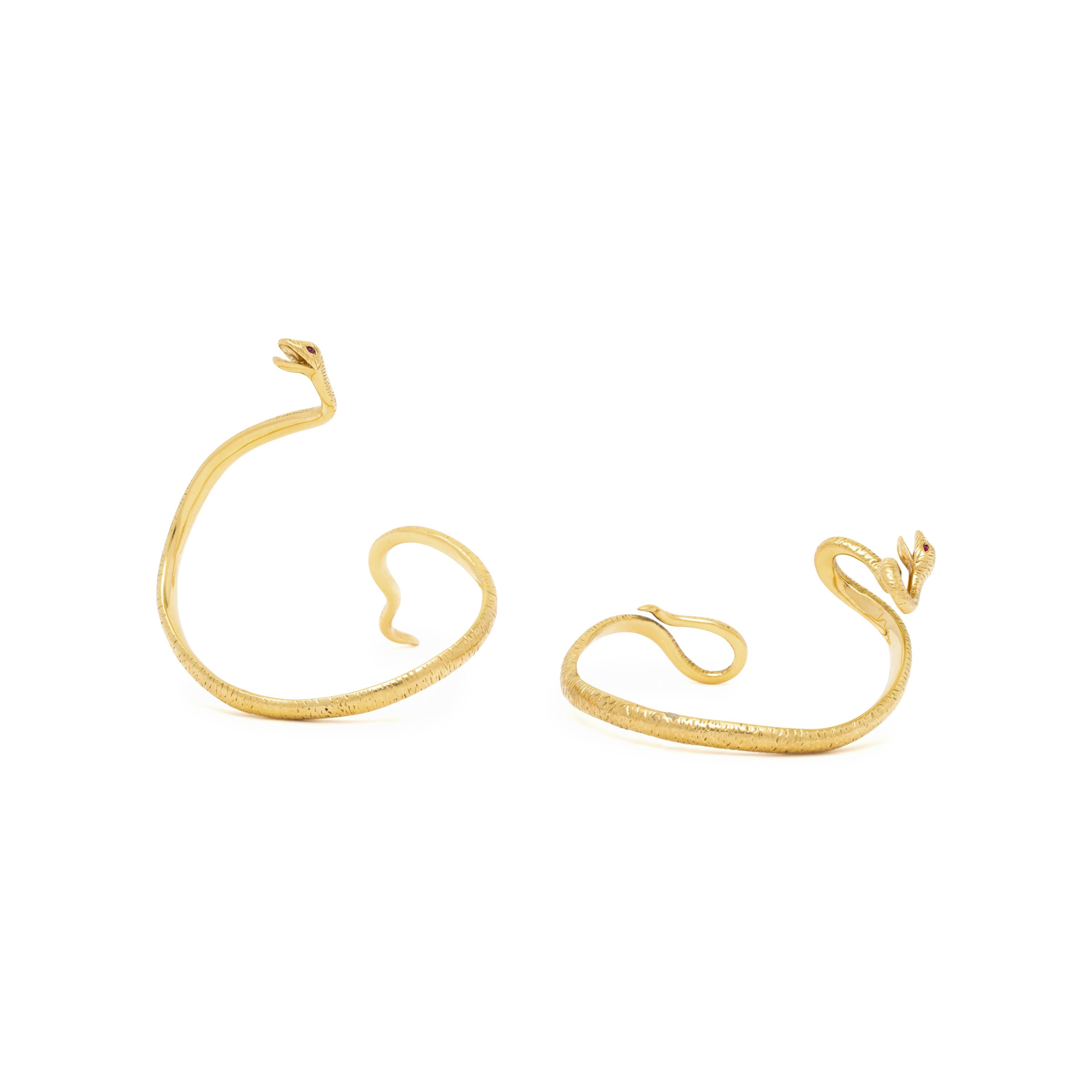 VERDURA, PAIR OF YELLOW GOLD AND RUBY 'MEDUSA' SERPENT CUFF BRACELETS