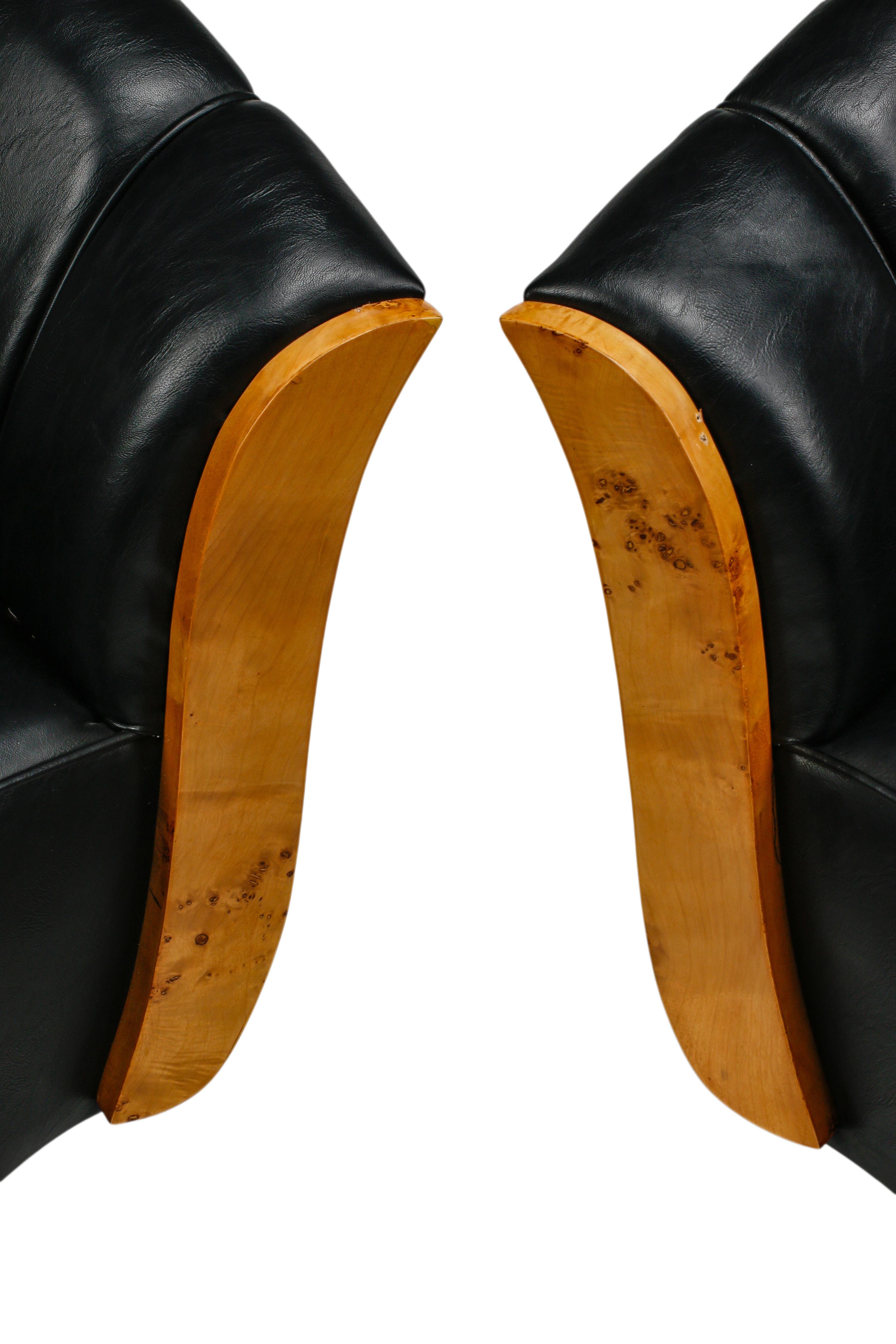 A Pair of Art Deco Style Burlwood and Faux Leather Armchairs