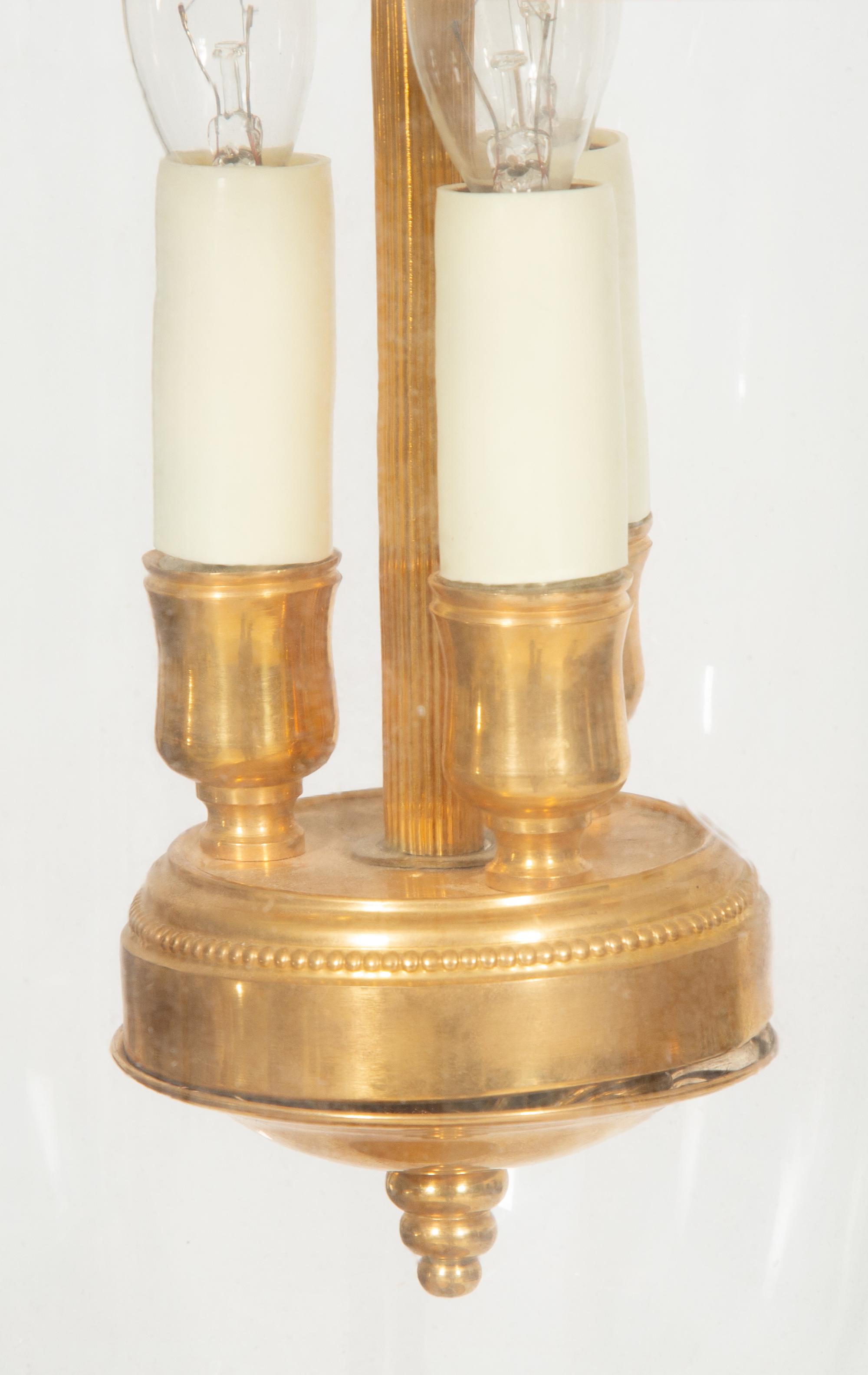 A Pair of French Gilt Metal and Glass Lanterns