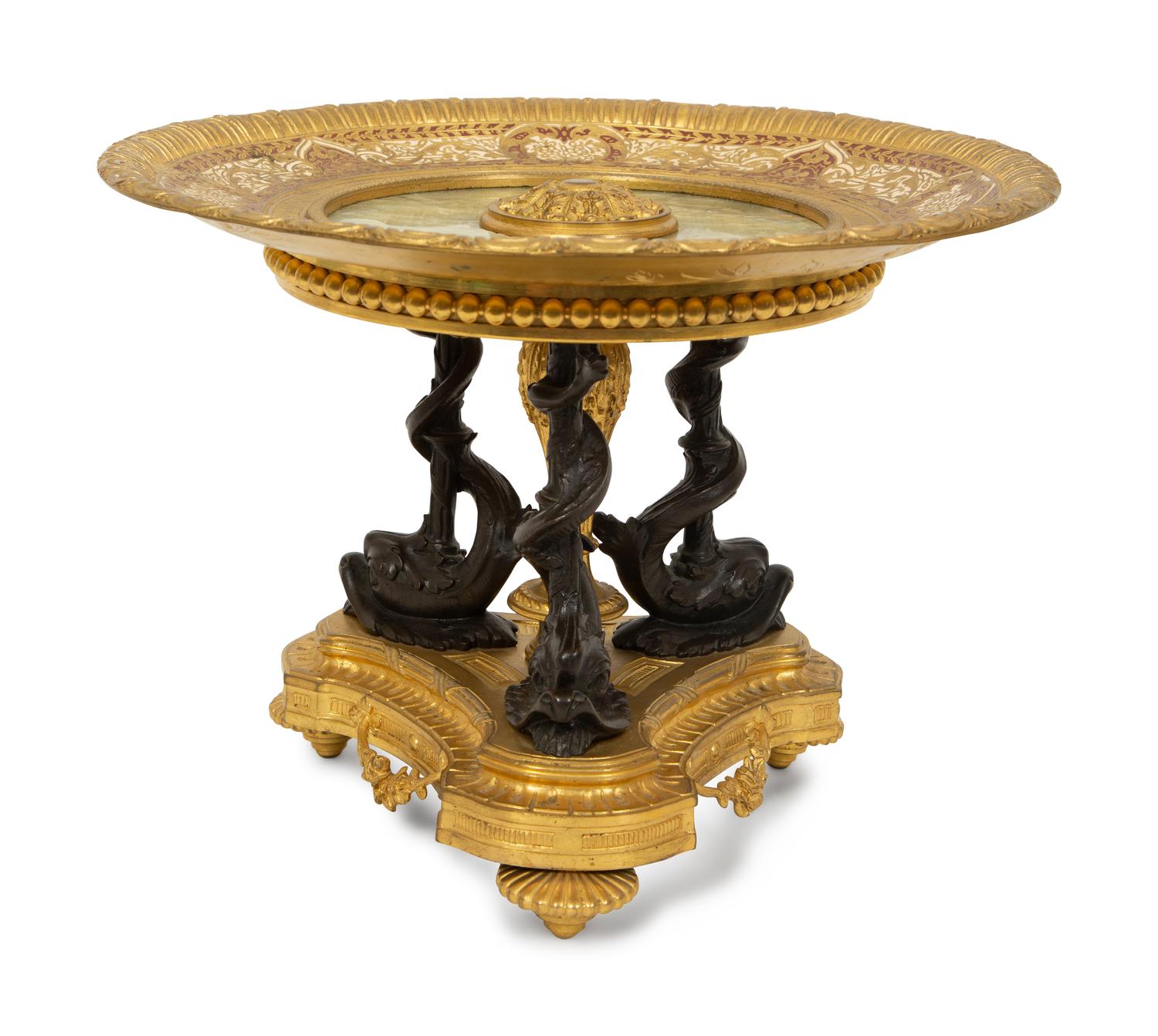 An Empire Style Patinated and Gilt Bronze Mounted Onyx Centerpiece