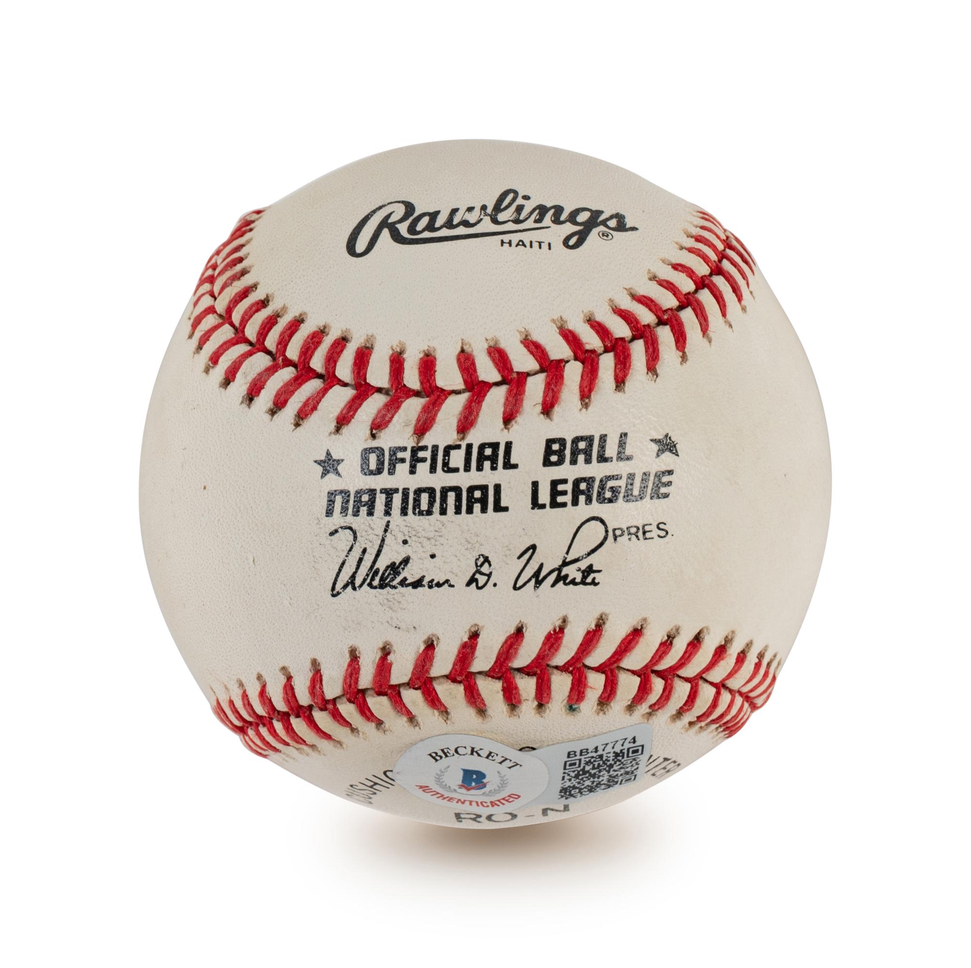 A Group of Four Milwaukee Braves Hall of Fame Signed Autograph Items Including Eddie Mathews and Warren Spahn (BAS Beckett Authentication Services Certified),