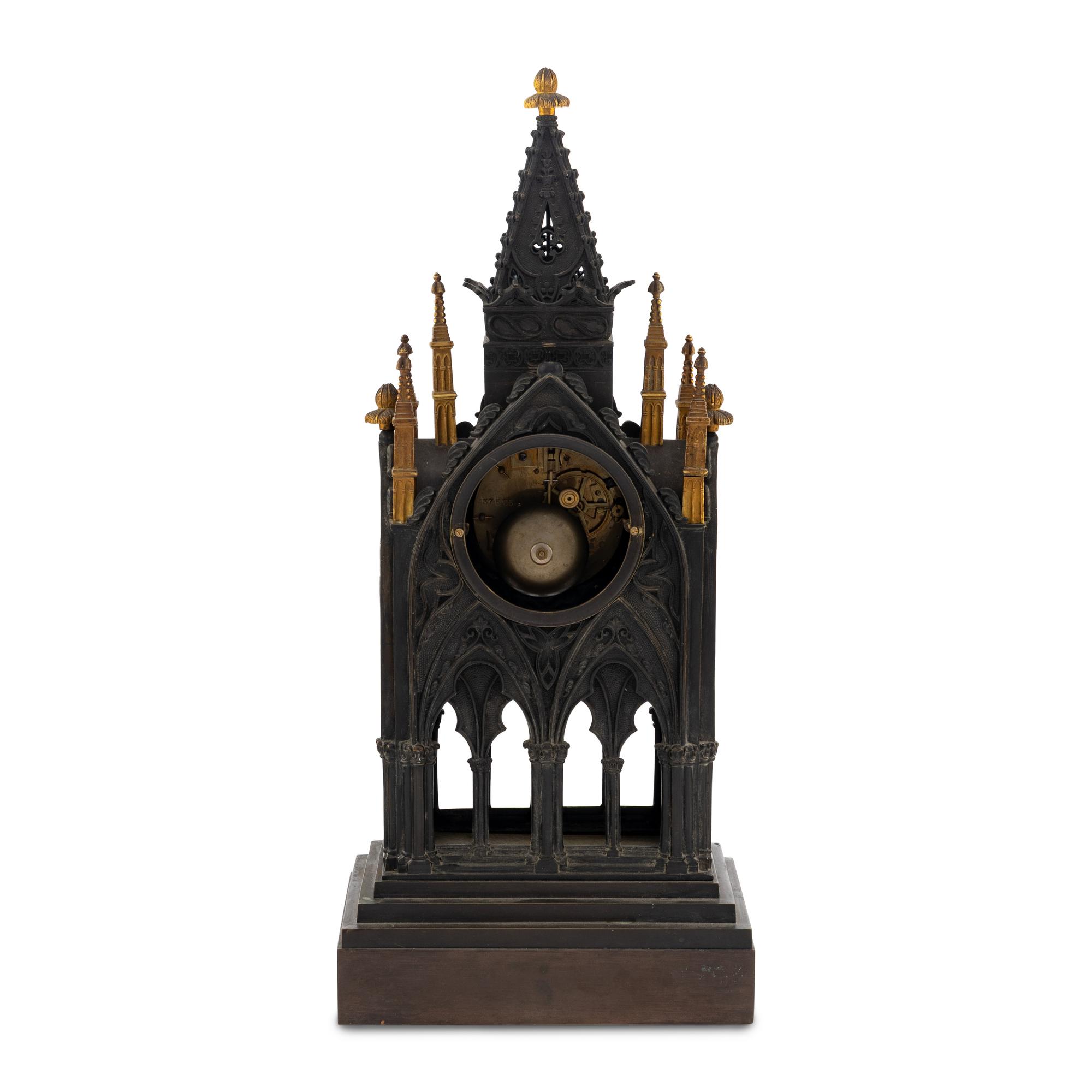 A French Patinated and Parcel Gilt Bronze Cathedral-Form Clock