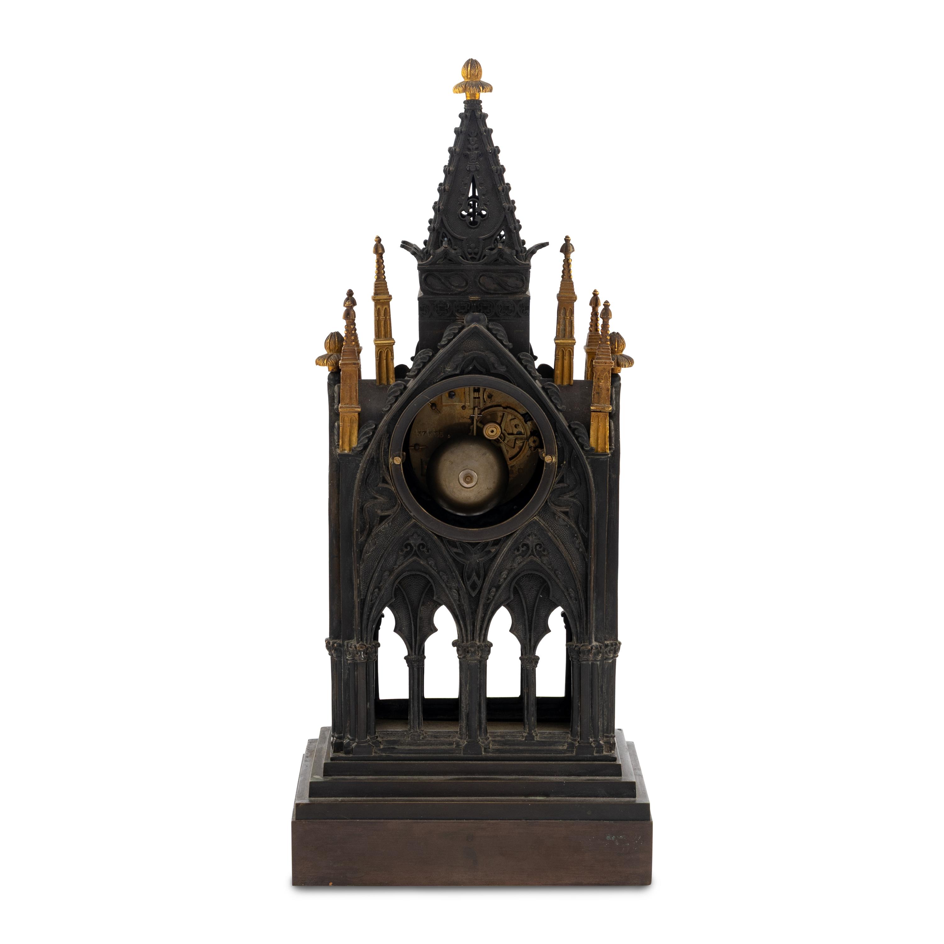 A French Patinated and Parcel Gilt Bronze Cathedral-Form Clock