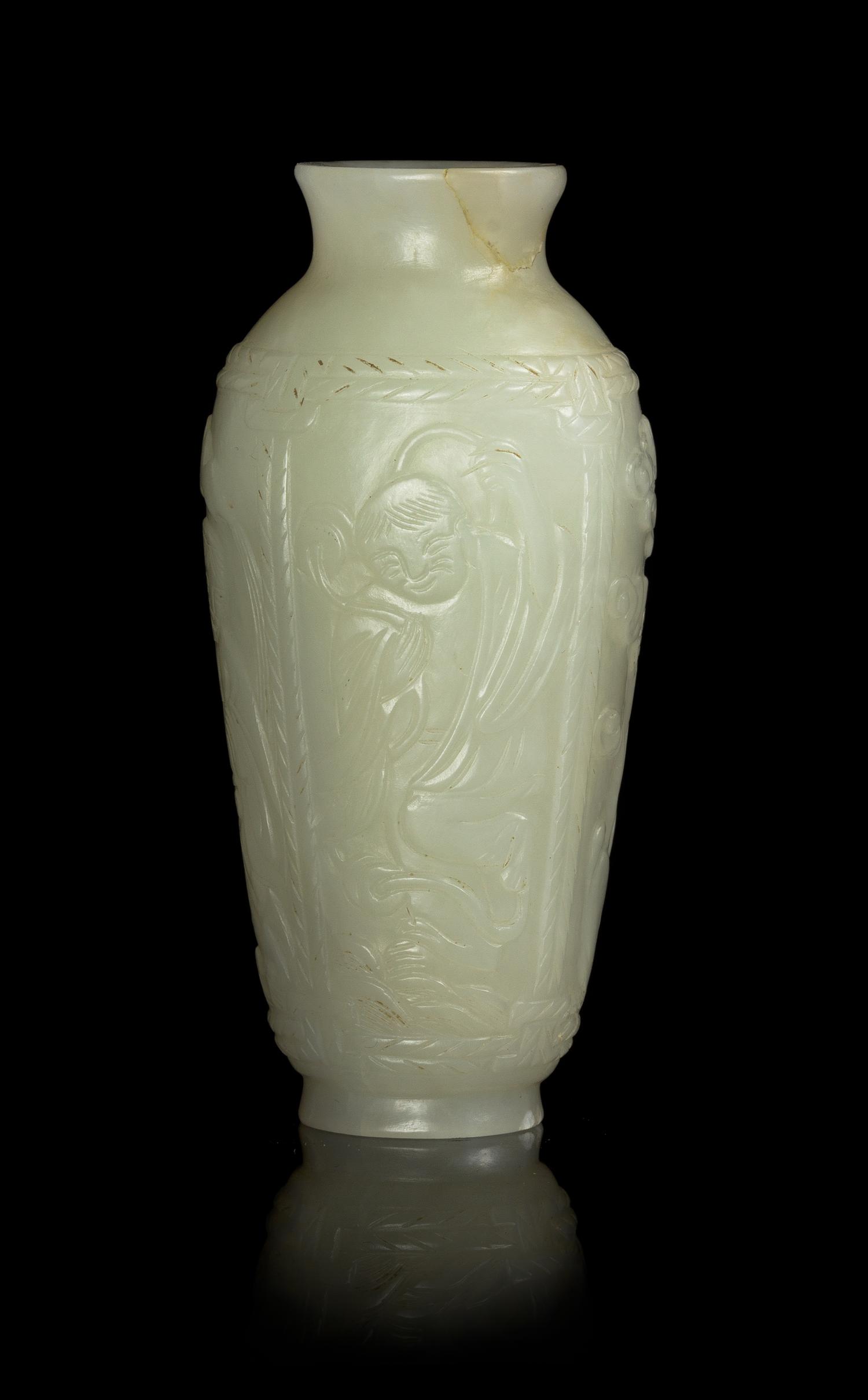 A Small Celadon Jade Vase Height 3 1/4 inches.