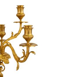 A Pair of Gilt Bronze Figural Seven-Light Candelabra