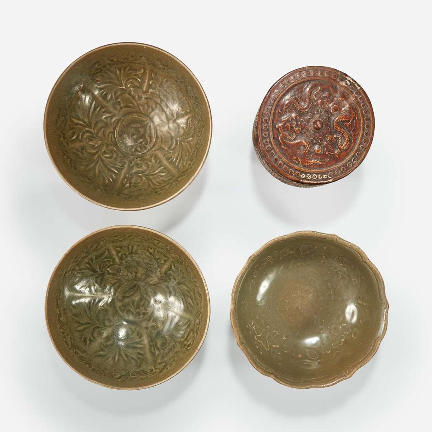 Group of three Vietnamese molded bowls and a molded box and cover Ly to Tran dynasties 11th -14th century