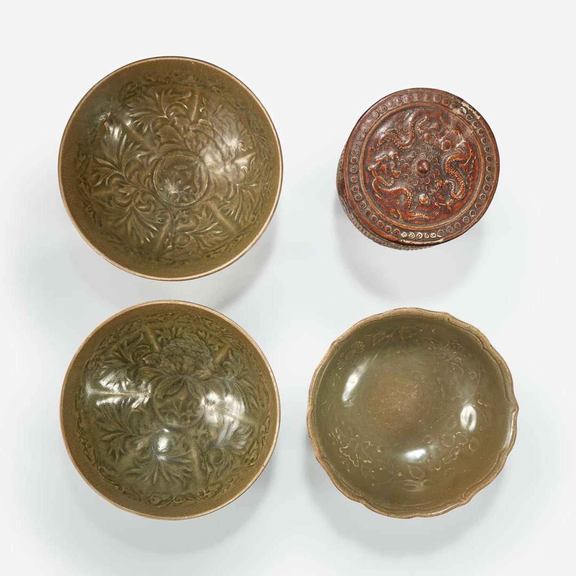 Group of three Vietnamese molded bowls and a molded box and cover Ly to Tran dynasties 11th -14th century