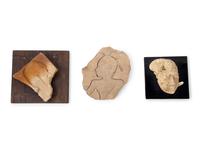 Two Egyptian Relief Fragments and a Mask Fragment, All After the Antique