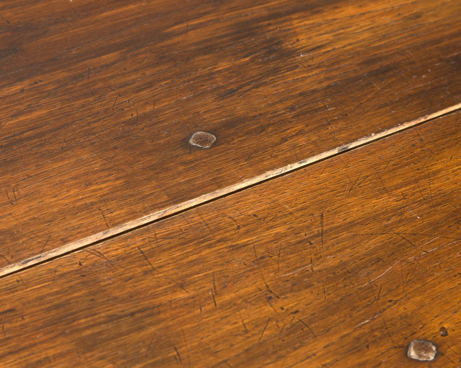 A Large Baroque Style Oak Drop-Leaf Dining Table