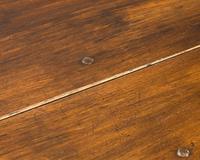 A Large Baroque Style Oak Drop-Leaf Dining Table