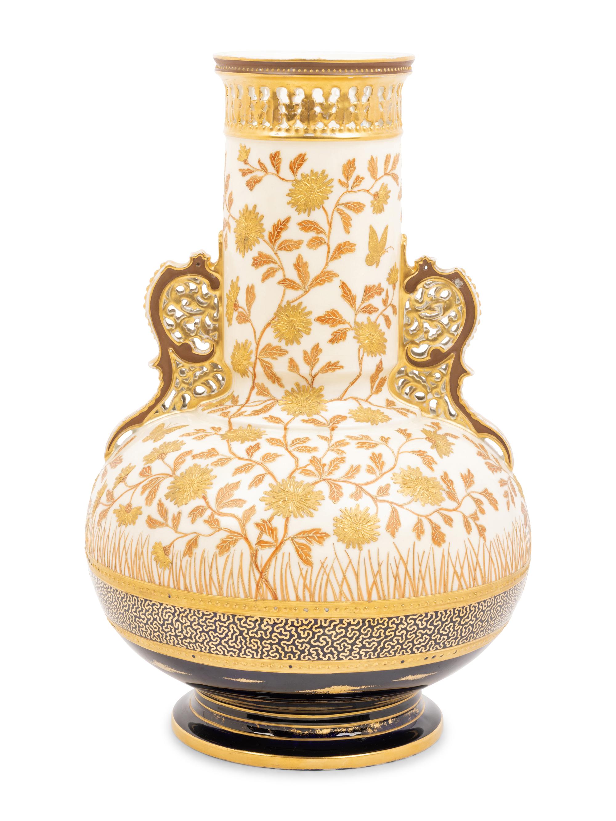 An Aesthetic Movement Gilt Decorated Earthenware Vase