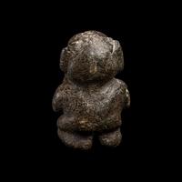 An Olmec Serpentine Kneeling Transformation Figure