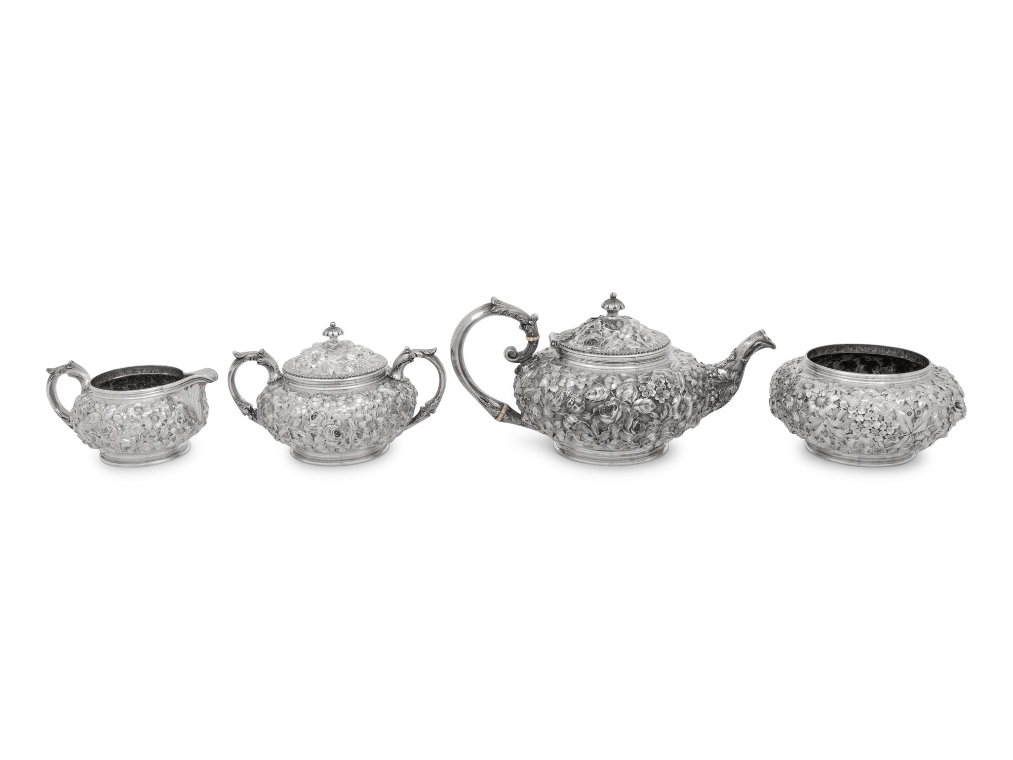 An American Silver Repoussé Four-Piece Tea Service