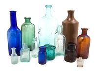 Eleven American Glass Bottles, Height of tallest 7 3/4 inches.