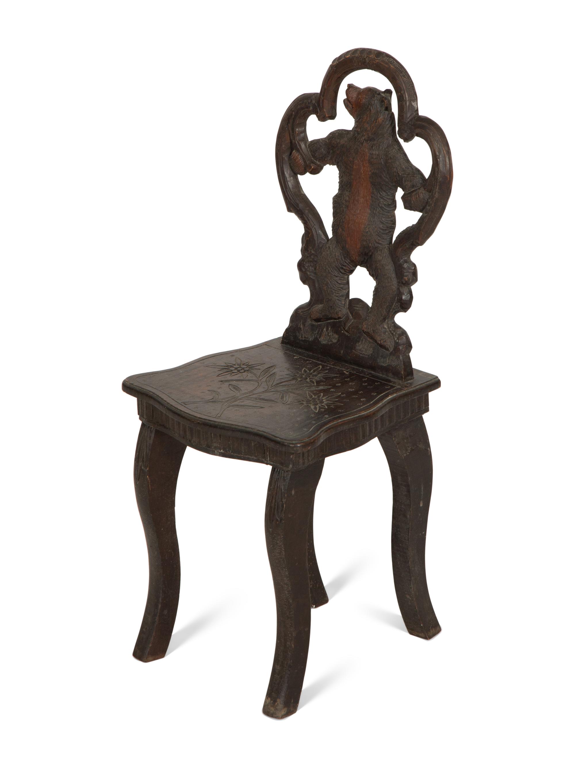 A Black Forest Carved Wood Child's Chair