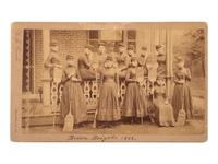 [WOMEN]. Broom Brigade 1888 . Boudoir photograph of an all-female military-style drill team.