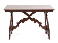A Spanish Baroque Style Walnut Trestle Table Height 30 x width 46 1/2 x depth 28 1/4 inches.