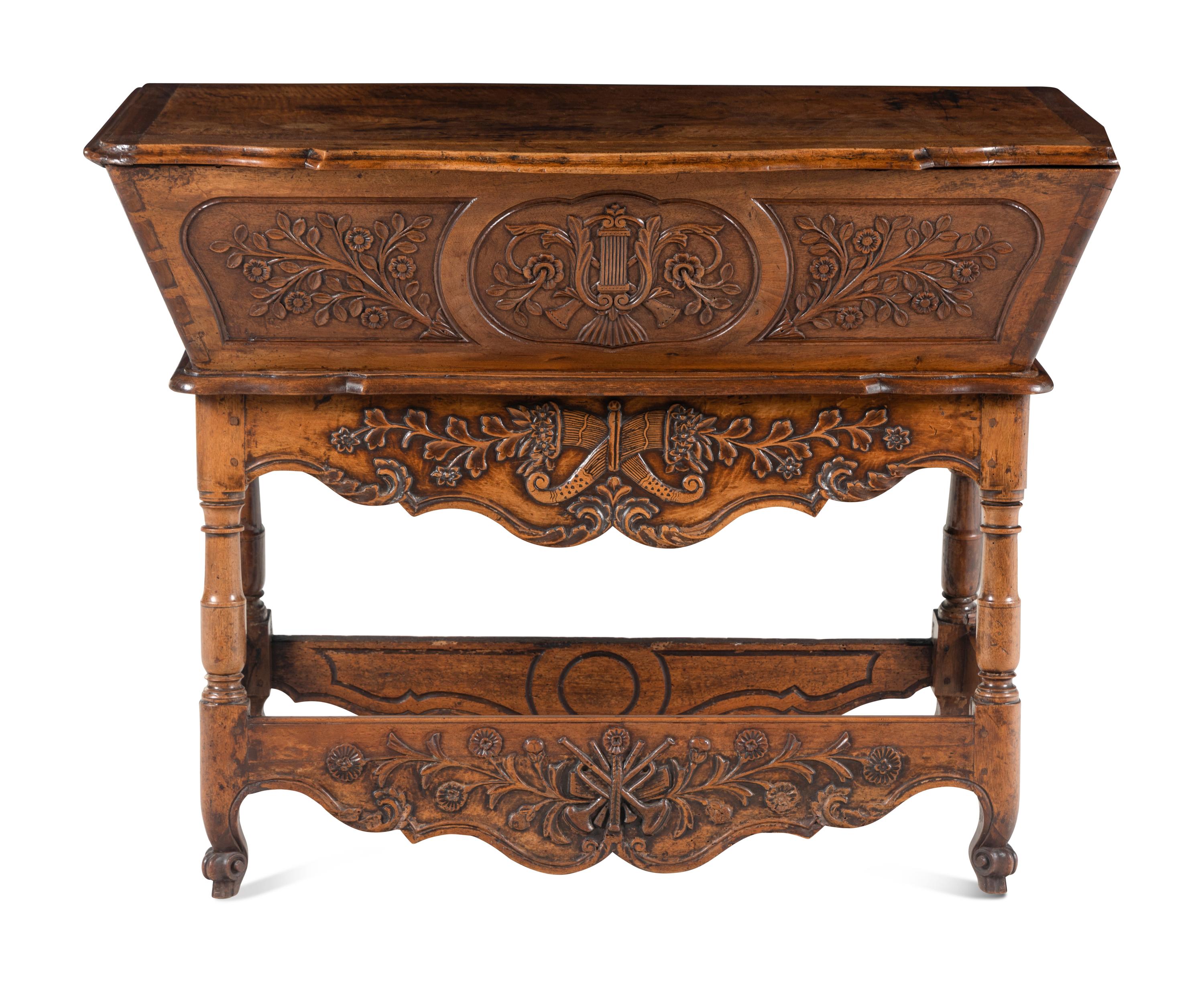 A French Provincial Carved Dough Box on Stand
