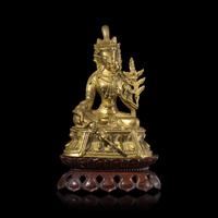 A Chinese Gilt Bronze Seated Figure of a Bodhisattva — 銅鎏金度母像