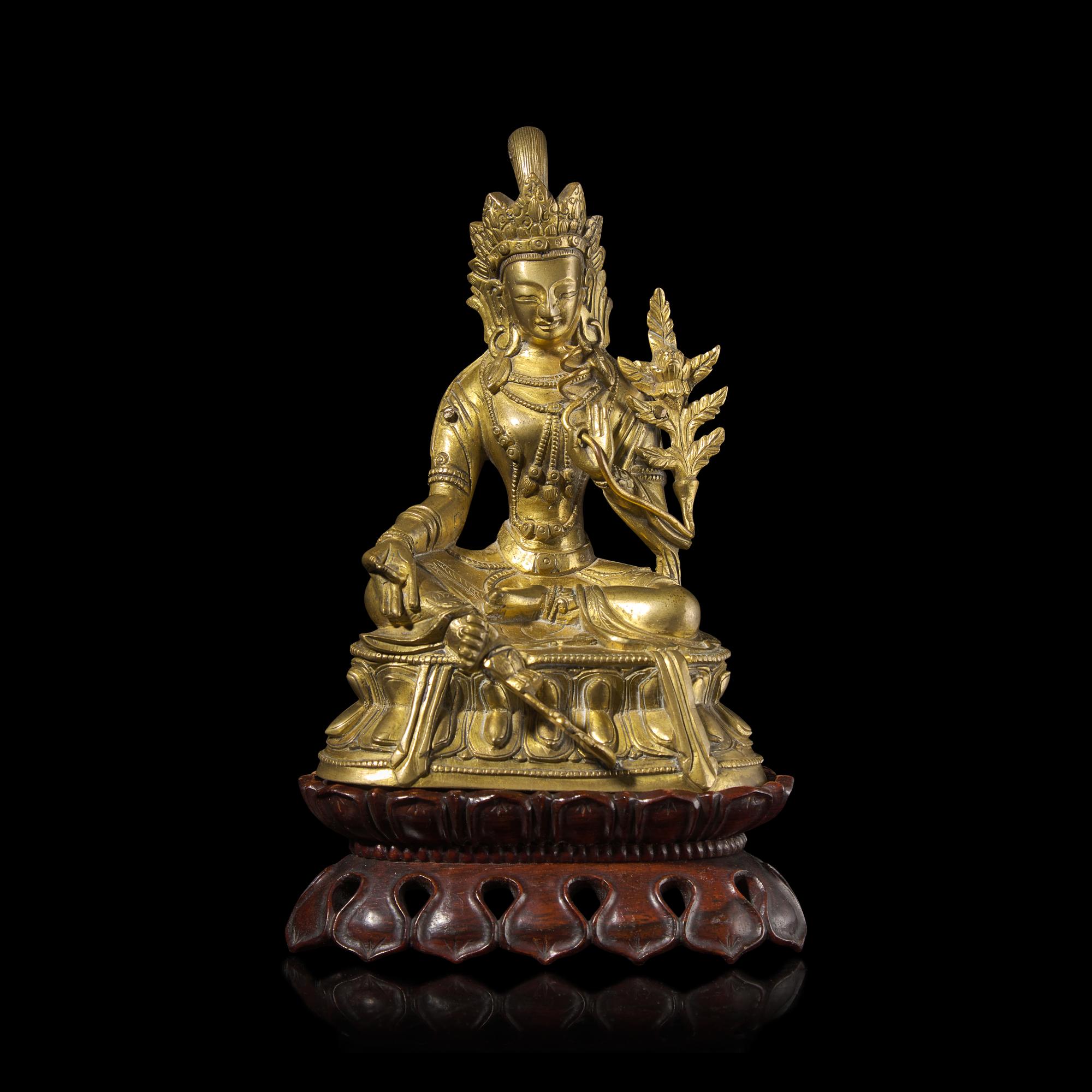 A Chinese Gilt Bronze Seated Figure of a Bodhisattva — 銅鎏金度母像