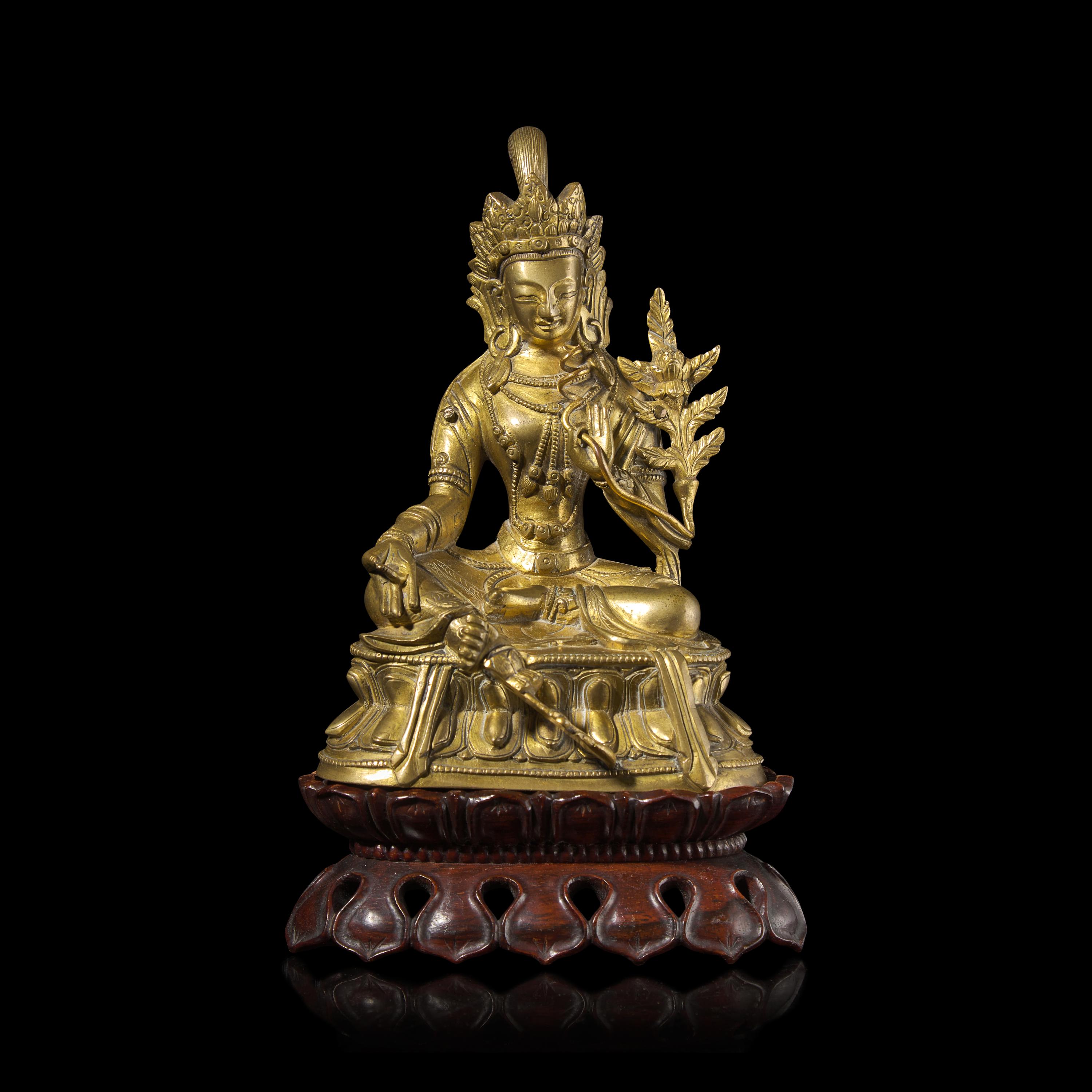 A Chinese Gilt Bronze Seated Figure of a Bodhisattva — 銅鎏金度母像