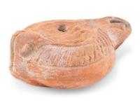 A Roman Terracotta Discus Lamp Depicting the God Hermes