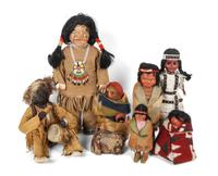 Seven Various Dolls Depicting Indians Height of tallest 14 inches.