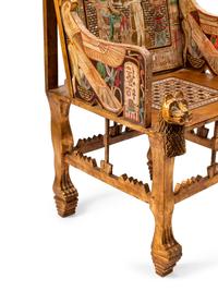 An Egyptian Style Parcel Gilt and Inlaid Throne Chair