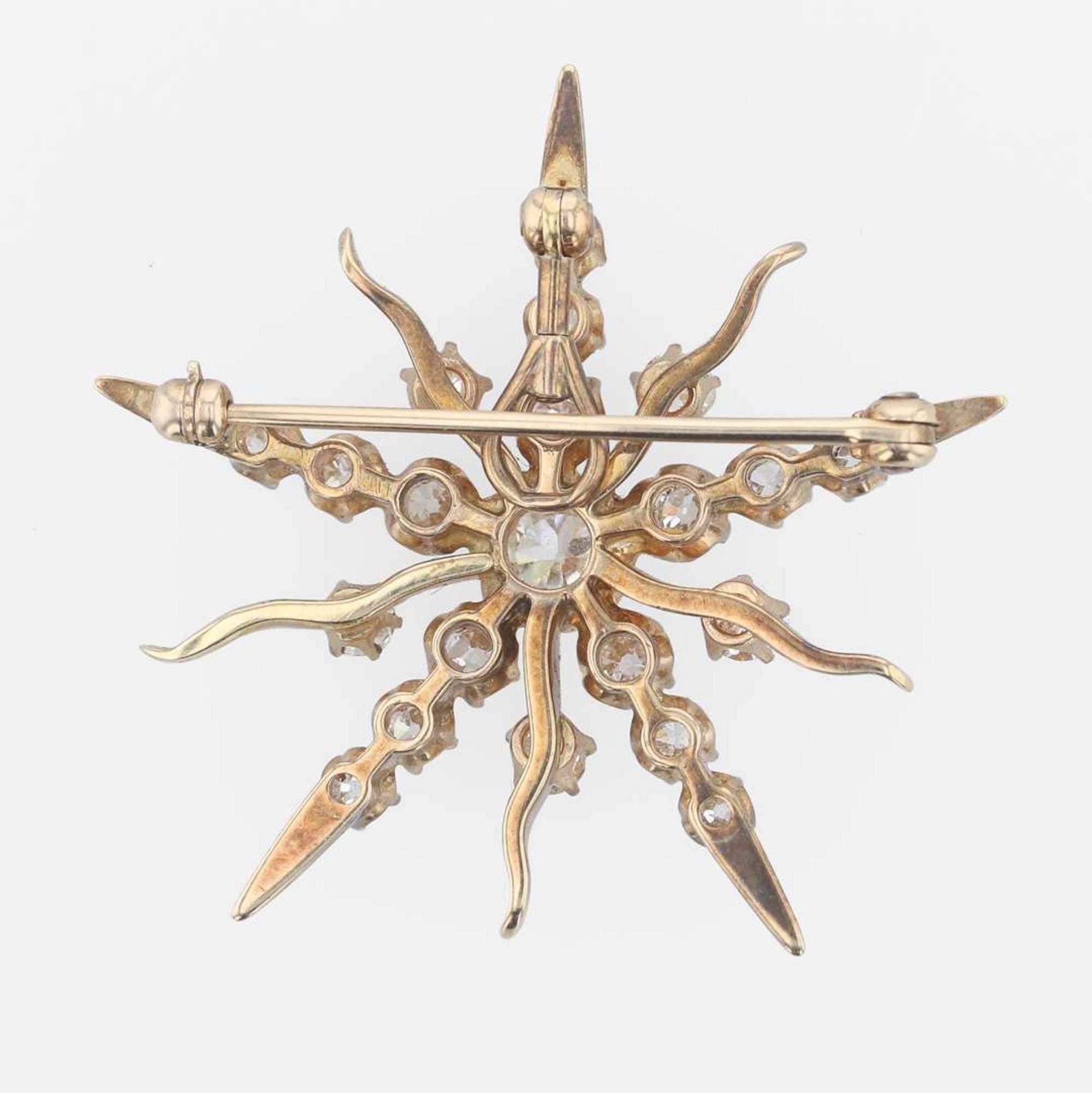 A 14K rose gold and diamond pendant/brooch